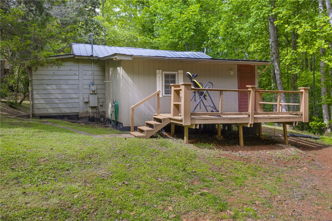 437 West Gate Road Pickens, SC 29671 - Photo 21 of 47 This charming cabin offers a private deck perfect for enjoying nature's tranquility.