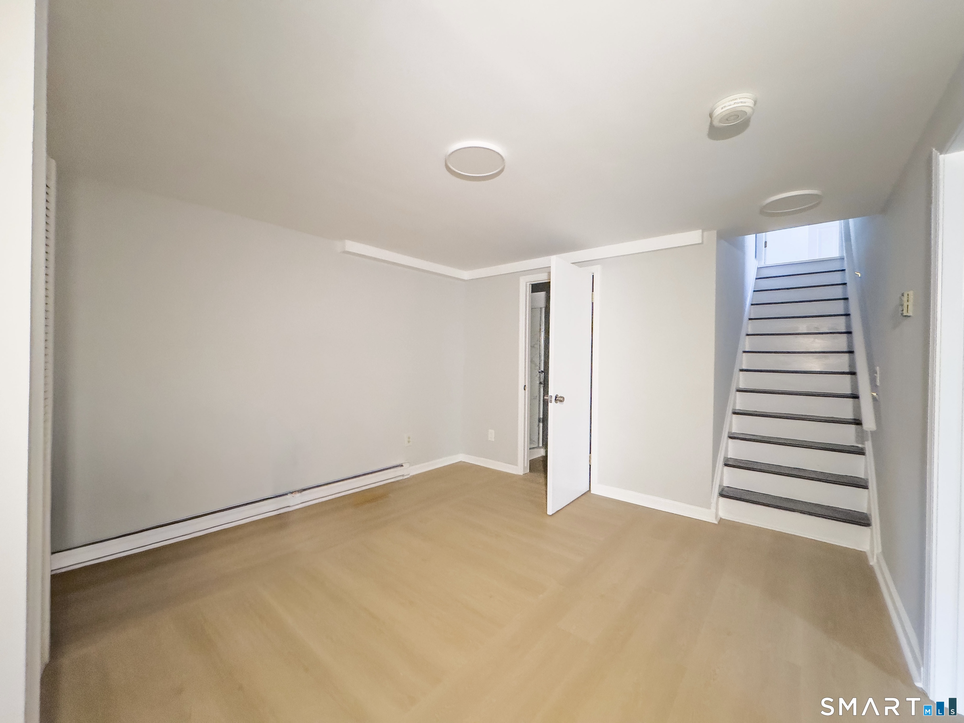 80 Olive Street Naugatuck, CT 06770 - Photo 18 of 28 a view of an empty room with a window