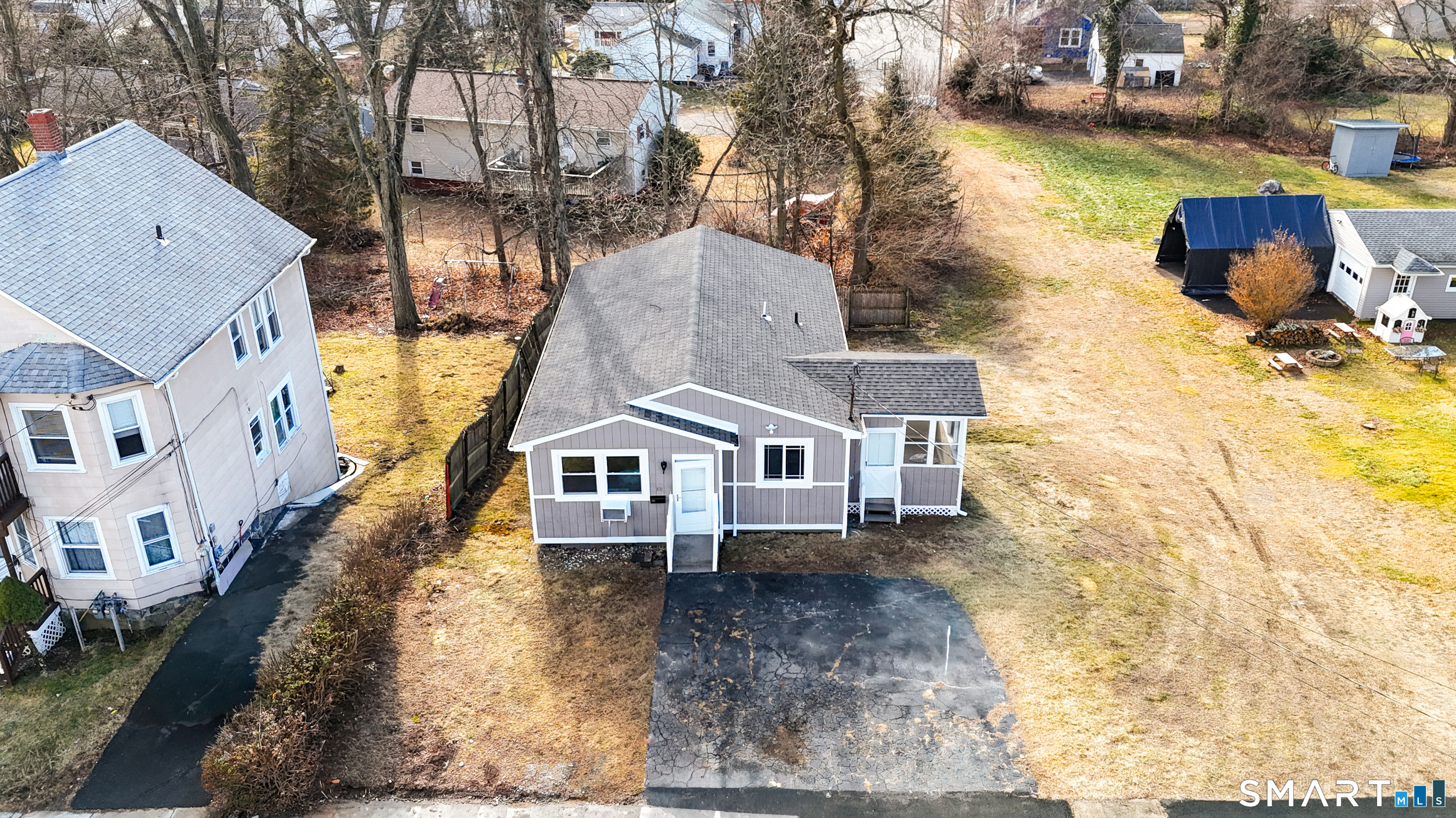 80 Olive Street Naugatuck, CT 06770 - Photo 28 of 28 a aerial view of a house with a yard