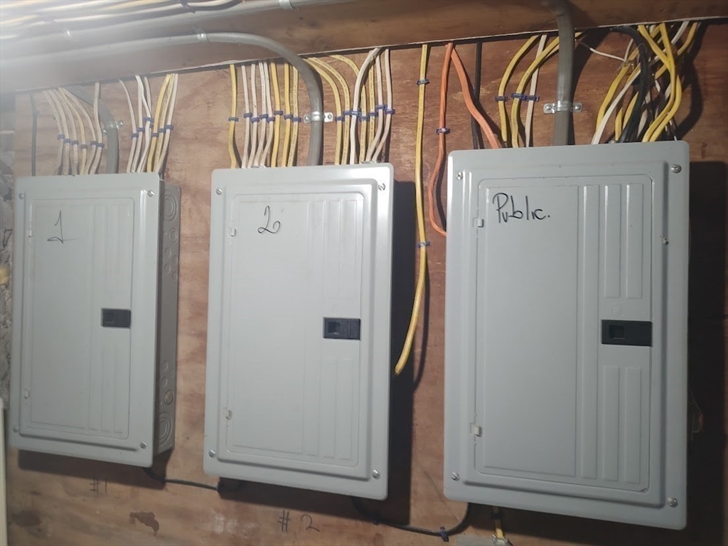 378 Ferry Street Everett, MA 02149 - Photo 24 of 26 a view of a door with a white wooden door