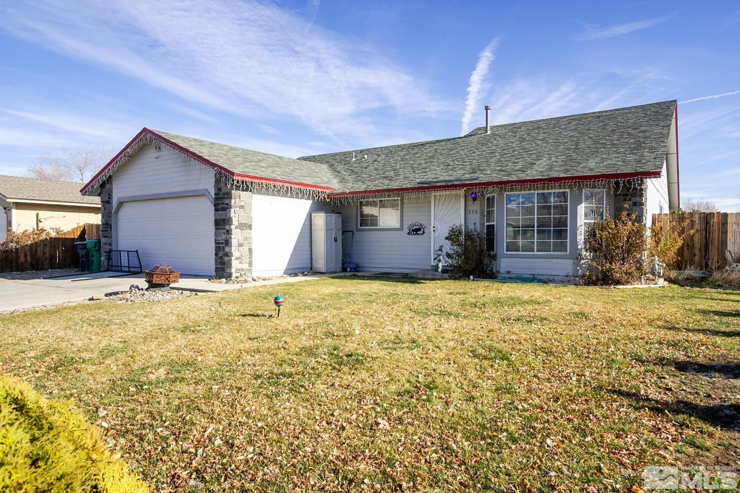 574 Yellow Jacket Road Dayton, NV 89403 - Photo 1 of 37 a view of a house with a yard