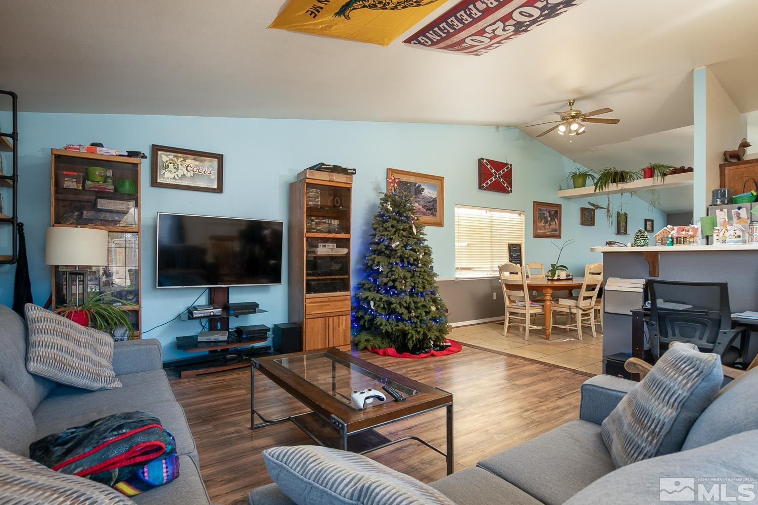 574 Yellow Jacket Road Dayton, NV 89403 - Photo 11 of 37 a living room with furniture and a flat screen tv