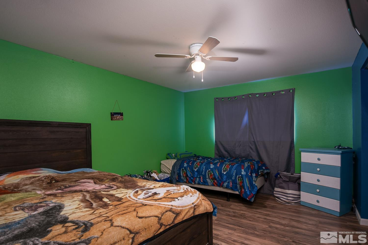 574 Yellow Jacket Road Dayton, NV 89403 - Photo 18 of 37 a bedroom with a bed and a dresser