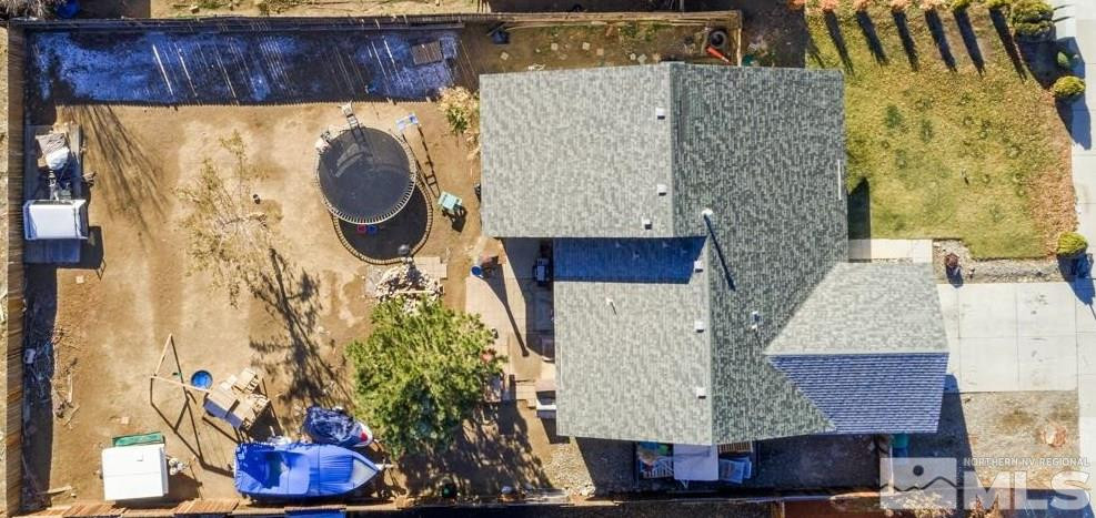 574 Yellow Jacket Road Dayton, NV 89403 - Photo 27 of 37 a aerial view of a house with table and chairs