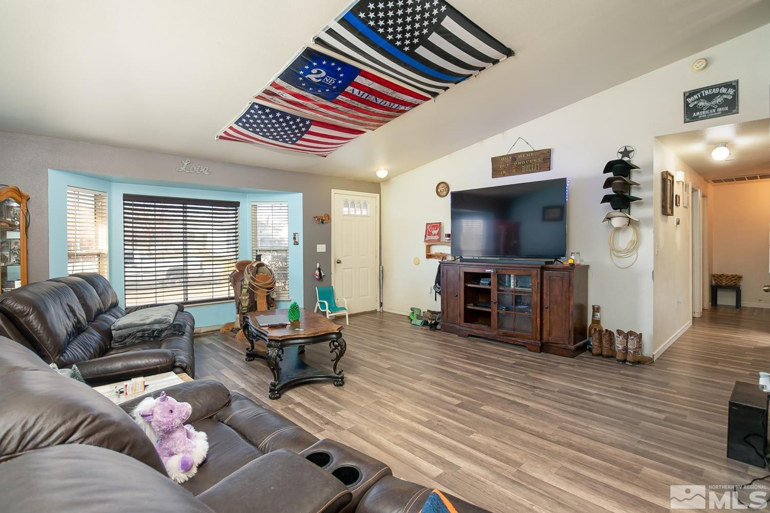 574 Yellow Jacket Road Dayton, NV 89403 - Photo 6 of 37 a living room with furniture and a flat screen tv