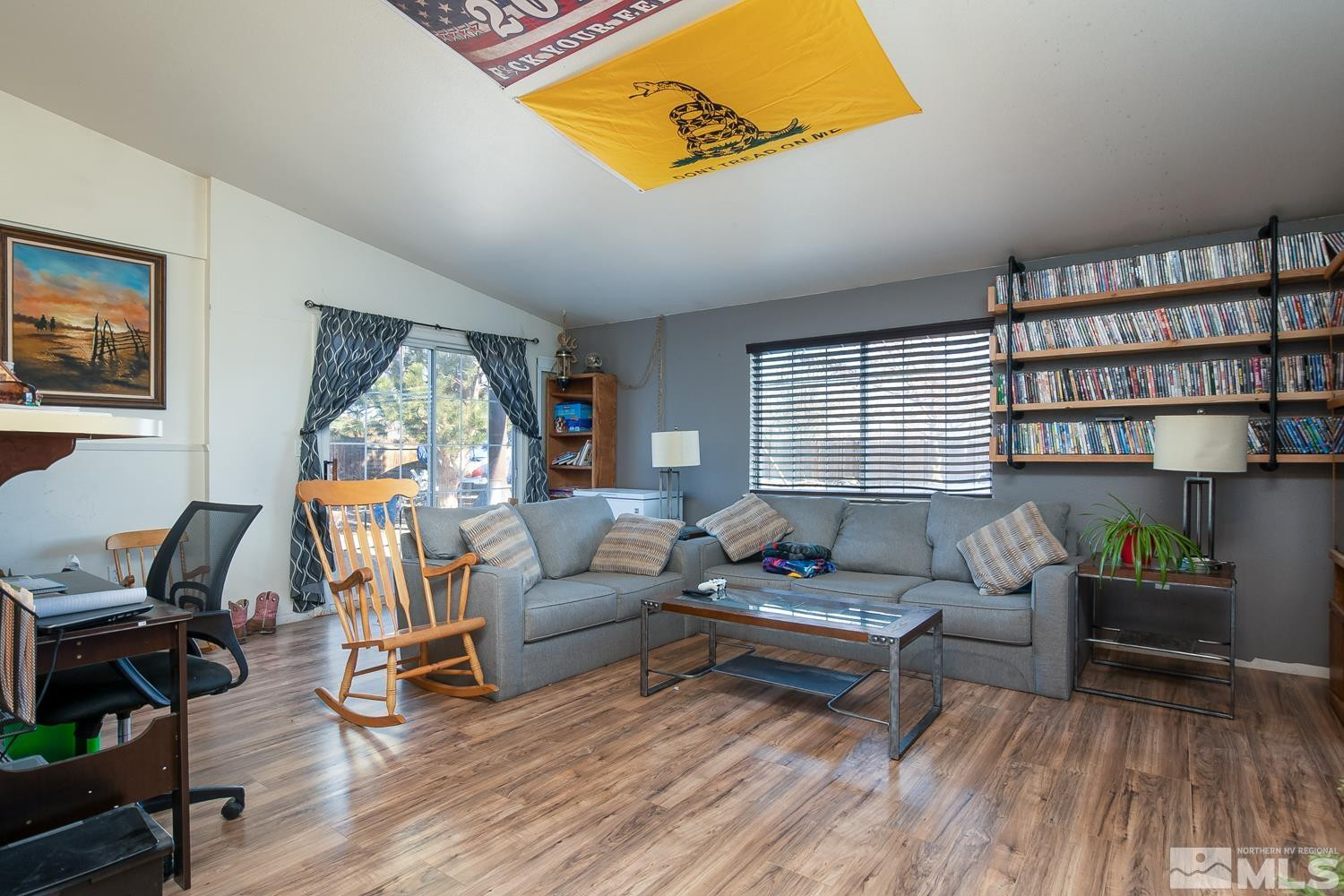 574 Yellow Jacket Road Dayton, NV 89403 - Photo 10 of 37 a living room with furniture and a wooden floor