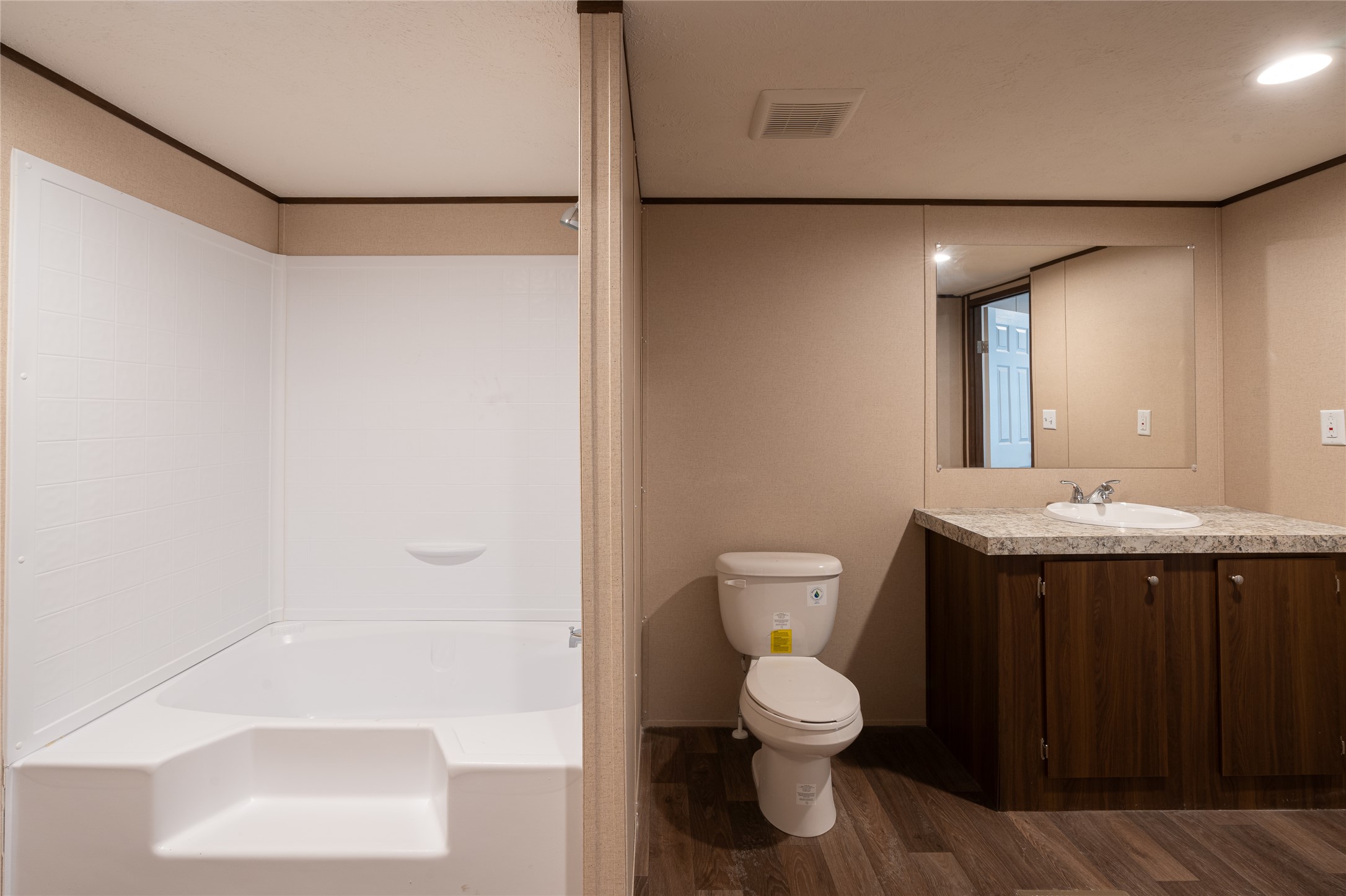 6945 Seawillow Road Lockhart, TX 78644 - Photo 16 of 21 a bathroom with a sink and a mirror