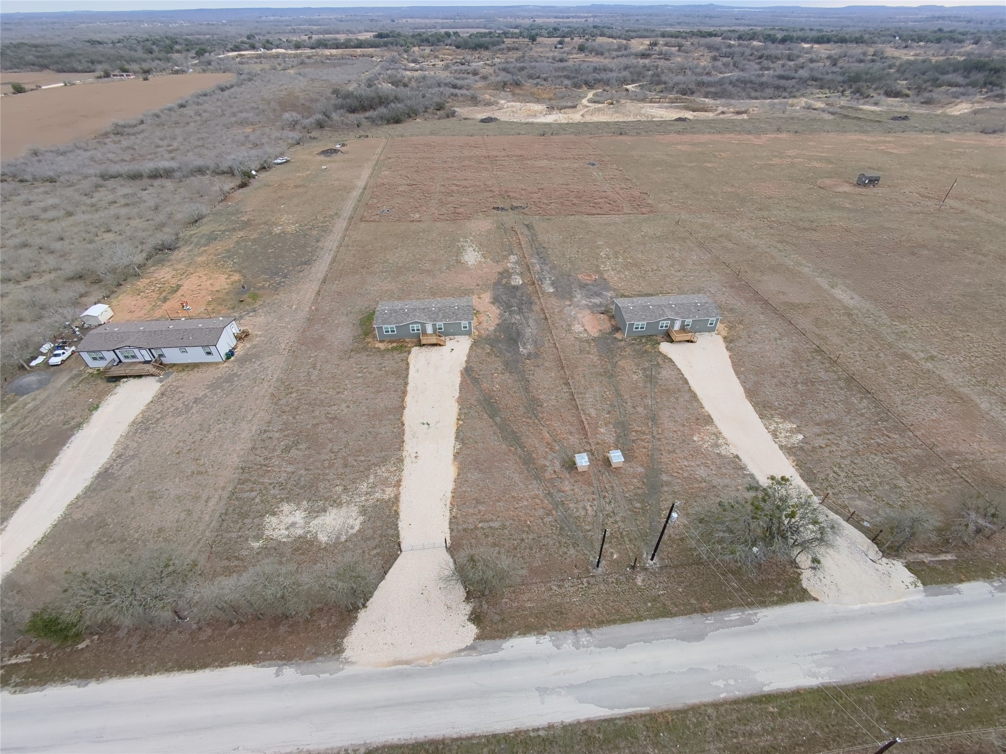 6945 Seawillow Road Lockhart, TX 78644 - Photo 20 of 21 an aerial view of a house