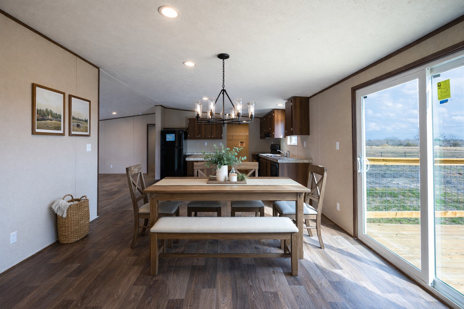 6945 Seawillow Road Lockhart, TX 78644 - Photo 8 of 21 a view of a dining room with furniture window and wooden floor