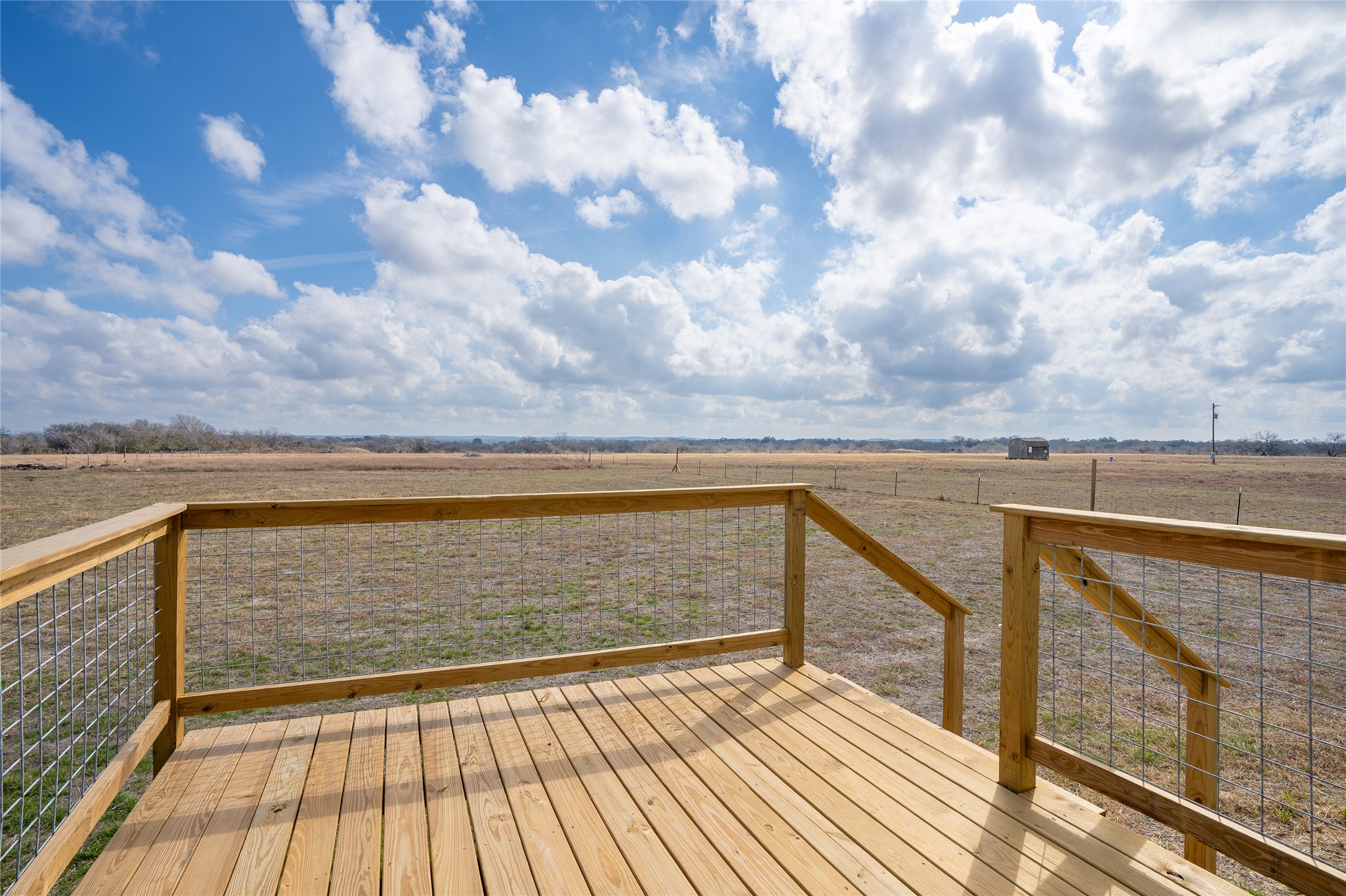 6945 Seawillow Road Lockhart, TX 78644 - Photo 9 of 21 a view of ocean from a balcony