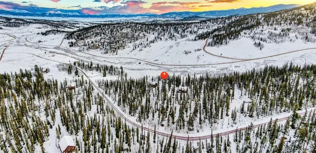 a view of a ocean with a mountain