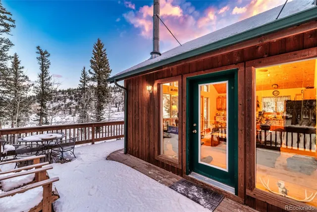 a view of a yard covered with snow