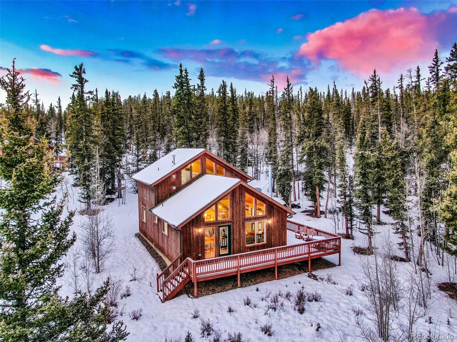 315 Haida Road Como, CO 80456 - Photo 46 of 50 a wooden bench sitting in the middle of a yard