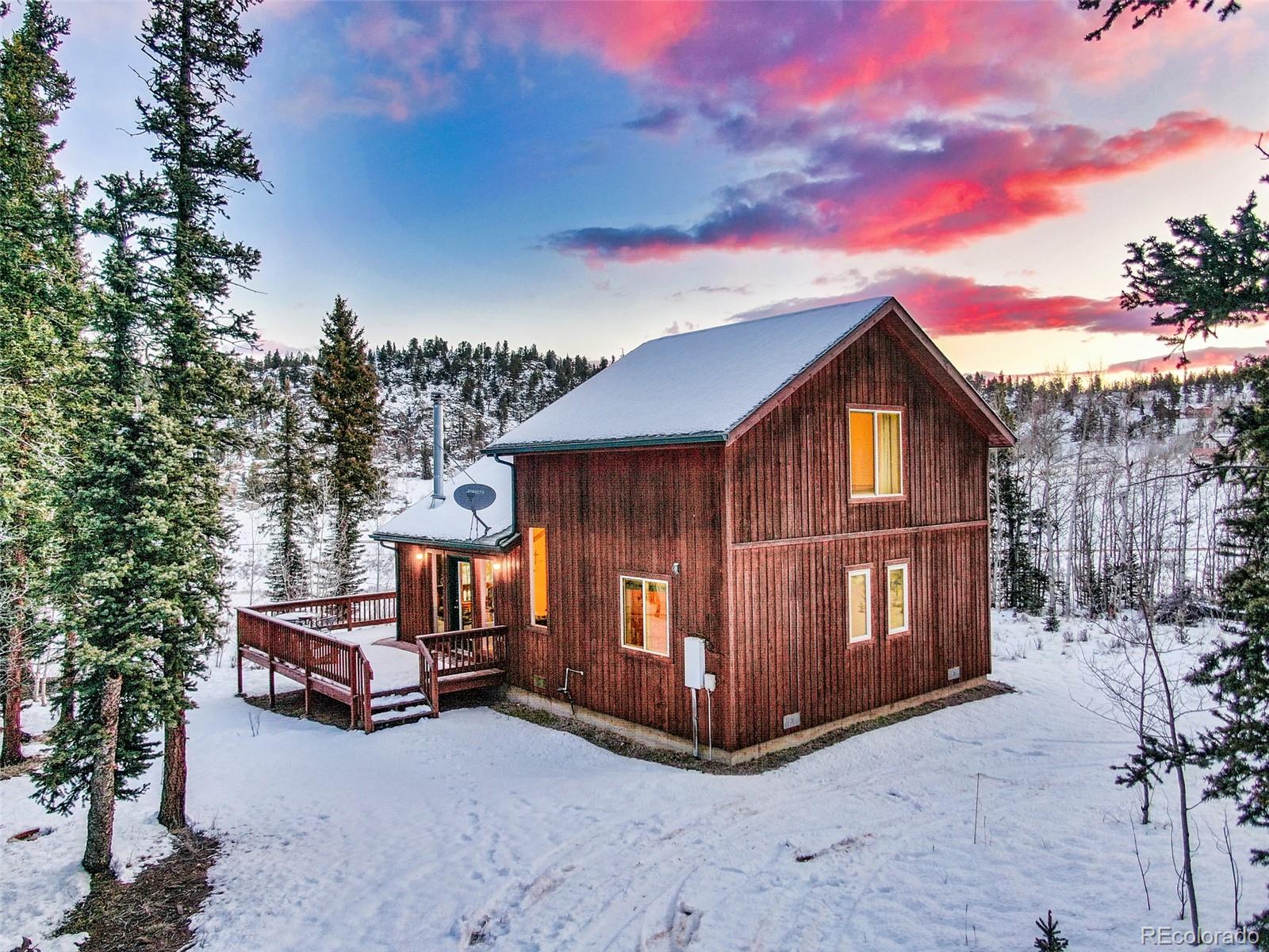 315 Haida Road Como, CO 80456 - Photo 47 of 50 a view of house with outdoor space and sitting area