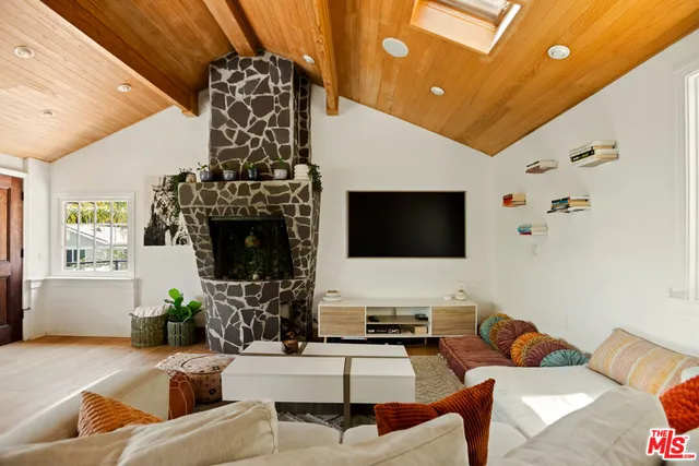 a kitchen with a sink stove and refrigerator