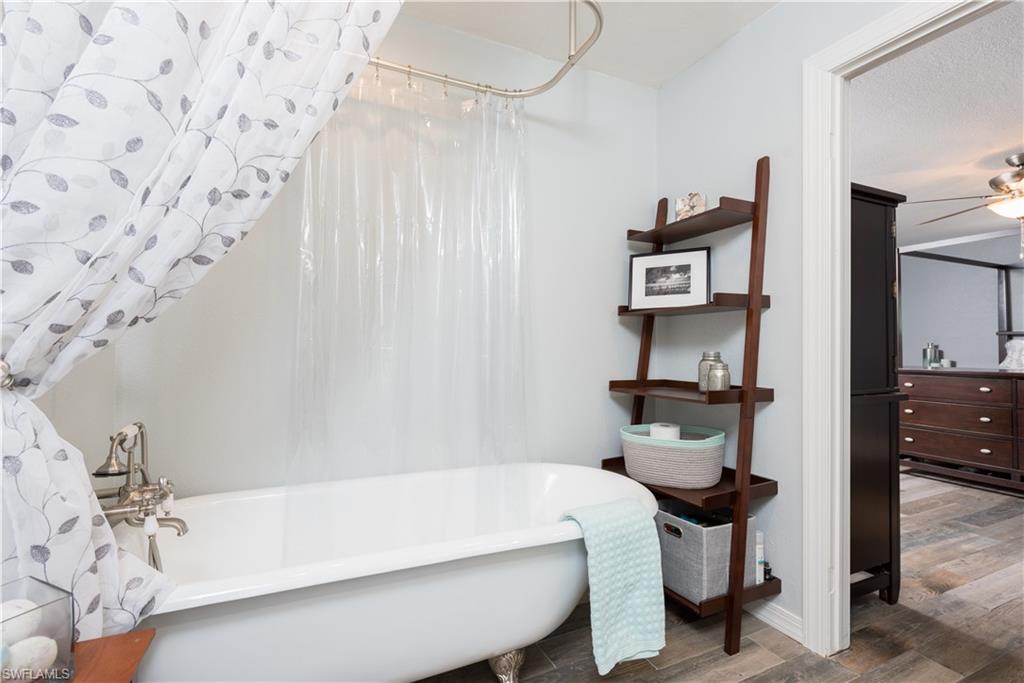 17401 Butler Road Fort Myers, FL 33967 - Photo 14 of 22 a bathroom with a sink and a bathtub