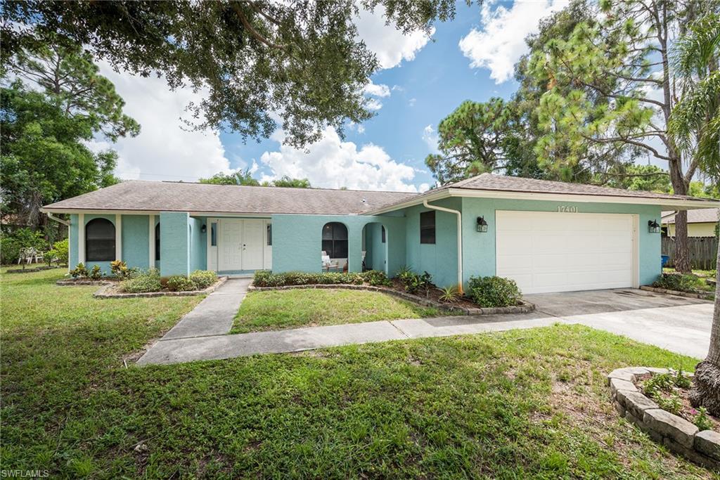 17401 Butler Road Fort Myers, FL 33967 - Photo 2 of 22 a view of a house with backyard and garden