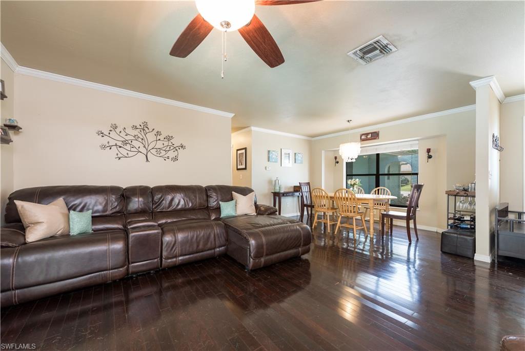 17401 Butler Road Fort Myers, FL 33967 - Photo 5 of 22 a living room with furniture and a large window