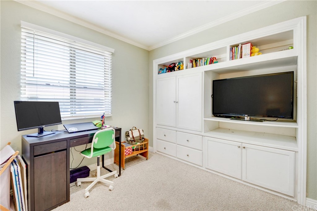 513 D Street, Unit 53 Upland, CA 91786 - Photo 17 of 25 a view of a livingroom with workspace and a window