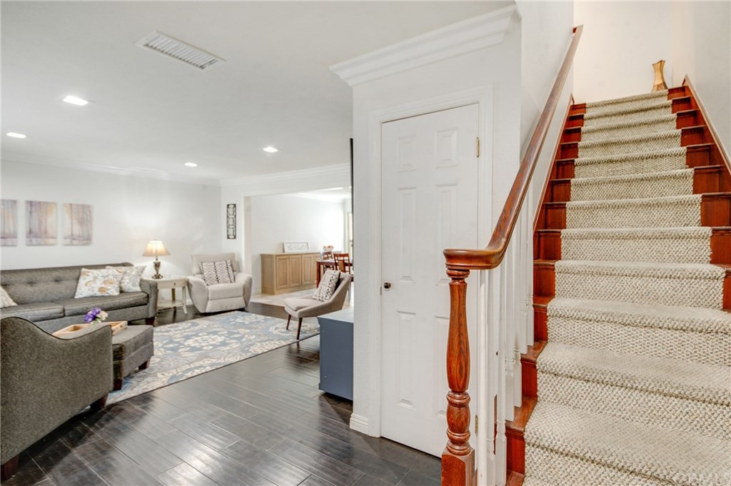 513 D Street, Unit 53 Upland, CA 91786 - Photo 2 of 25 a living room with furniture and stairs