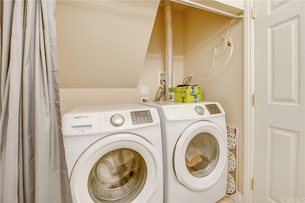 513 D Street, Unit 53 Upland, CA 91786 - Photo 10 of 25 a utility room with dryer and washer