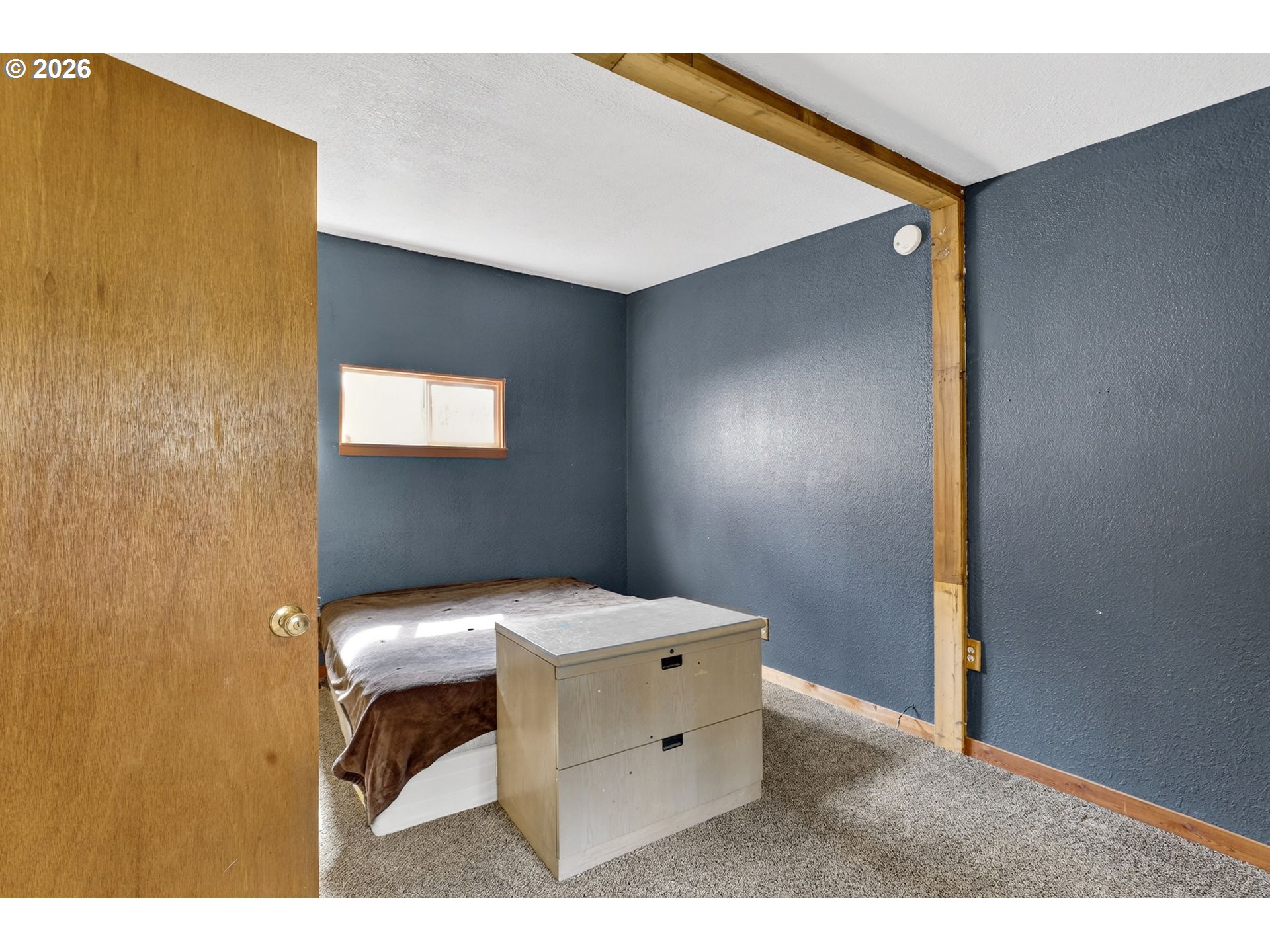 72 Brunning Road Stevenson, WA 98648 - Photo 23 of 47 a bedroom with a bed and a dresser