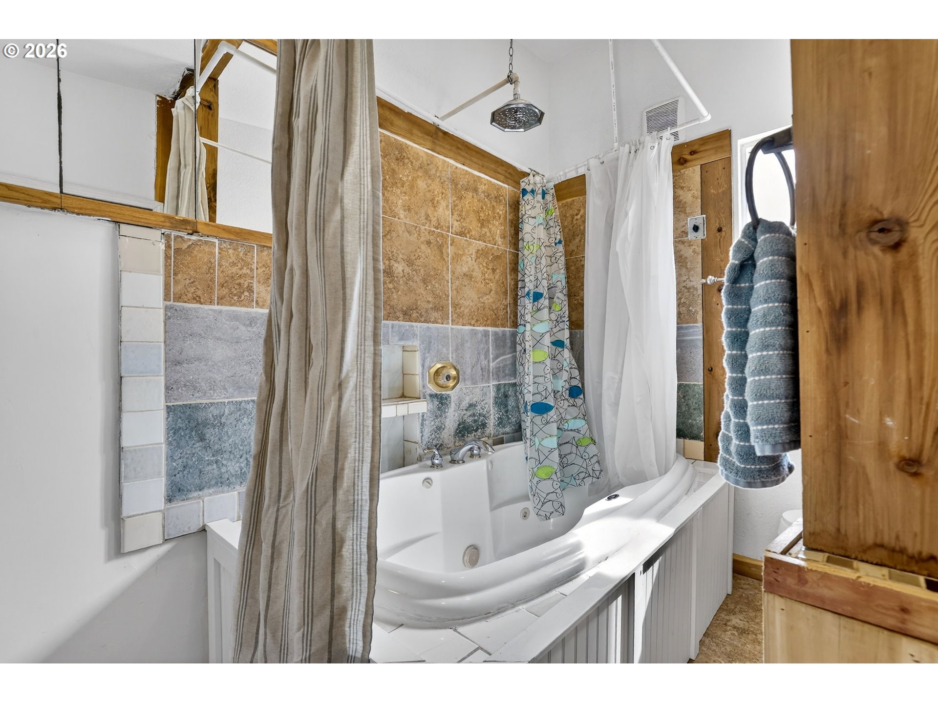 72 Brunning Road Stevenson, WA 98648 - Photo 25 of 47 a bathroom with a granite countertop sink and a mirror