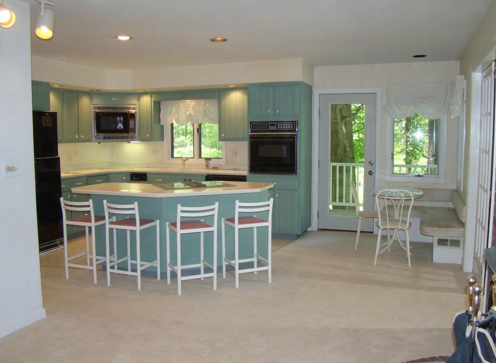 186 Cedarwood Road Auburn, ME 04210 - Photo 16 of 35 Kitchen open to breakfast nook.