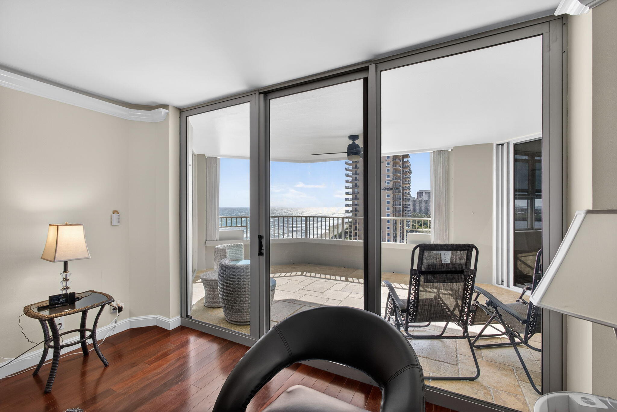 5200 North Ocean Drive, Unit 1004 Singer Island, FL 33404 - Photo 13 of 26 a bedroom with furniture and a window