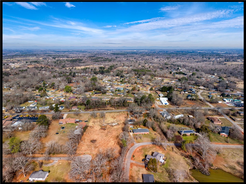 2205 Whitehall Road Anderson, SC 29625 - Photo 5 of 13 An aerial perspective reveals the expansive landscape of this verdant residential area.