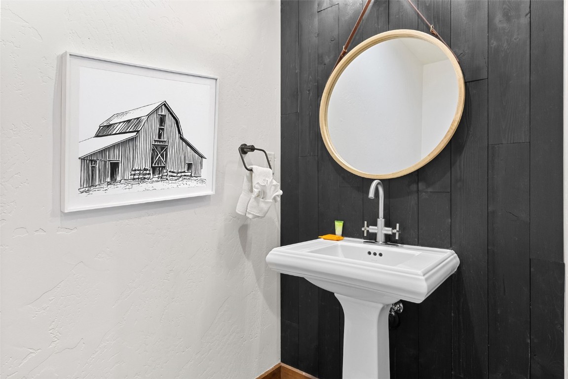 1175 Bangtail Way, Unit 5118 Steamboat Springs, CO 80487 - Photo 16 of 46 a bathroom with a sink and a mirror
