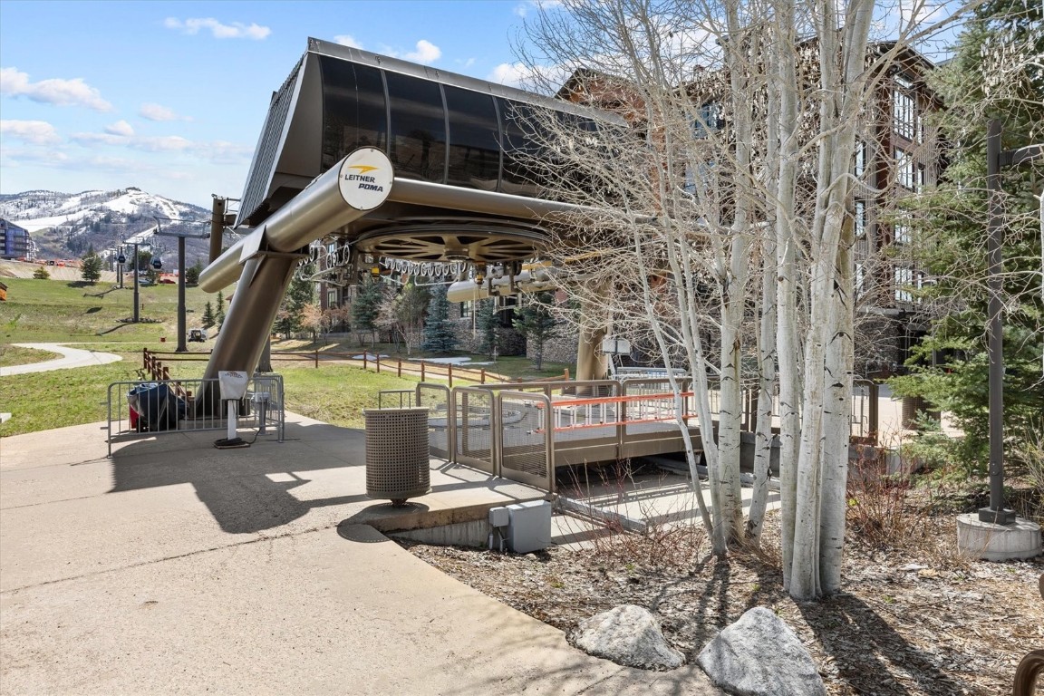 1175 Bangtail Way, Unit 5118 Steamboat Springs, CO 80487 - Photo 38 of 46 a front view of a house with a garden