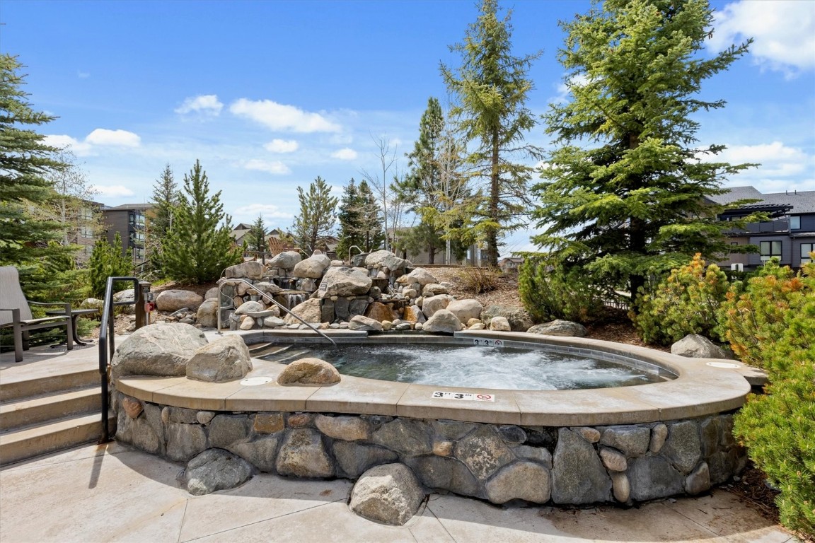 1175 Bangtail Way, Unit 5118 Steamboat Springs, CO 80487 - Photo 39 of 46 a view of swimming pool with outdoor seating and plants