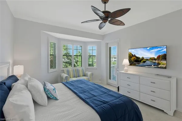 a bathroom with a sink double vanity and a mirror