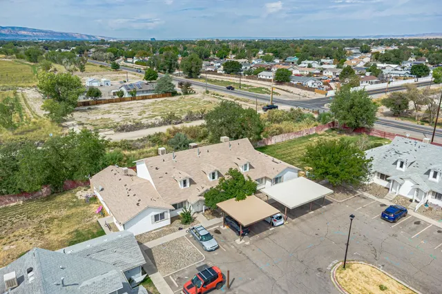 a view of a city with a lake