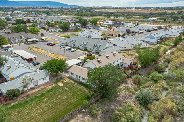 an aerial view of a city with lots of residential buildings
