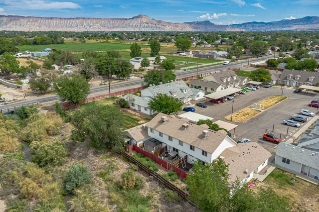 an aerial view of a house with a garden