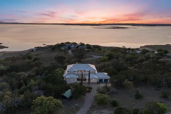 a view of a lake from a yard