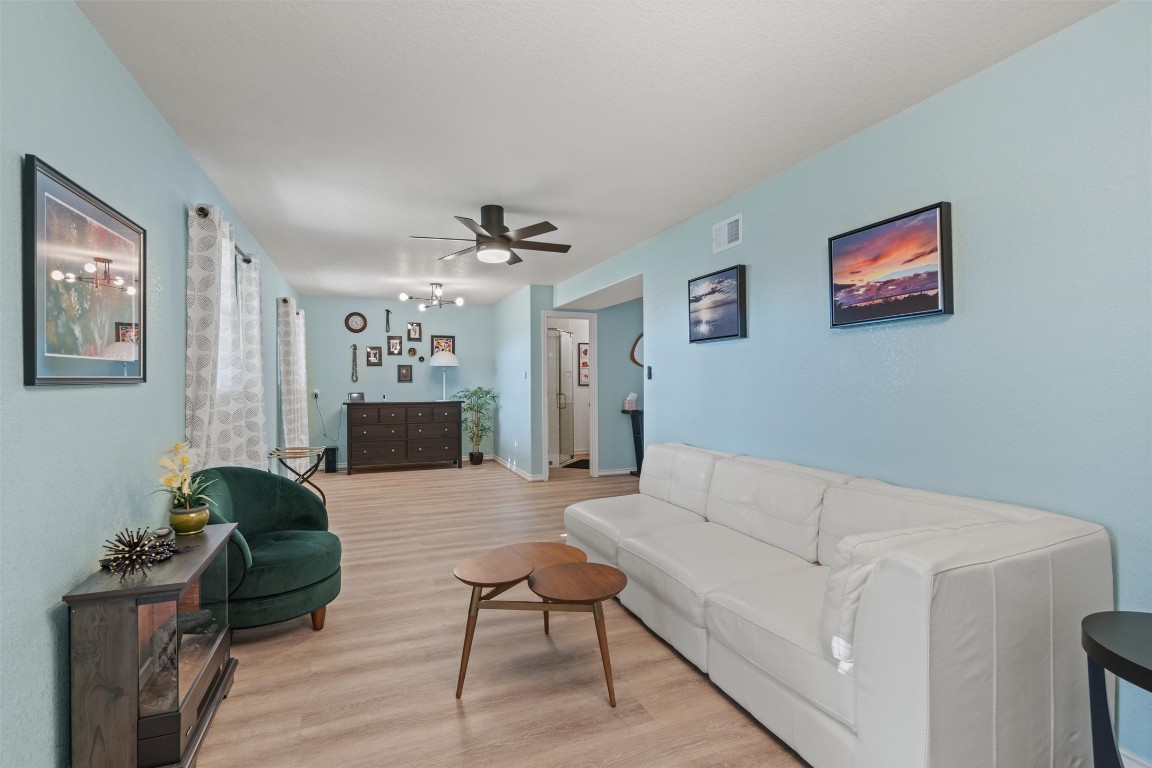 4401 Sunset Cliff Road Burnet, TX 78611 - Photo 29 of 40 a living room with furniture and a wooden floor