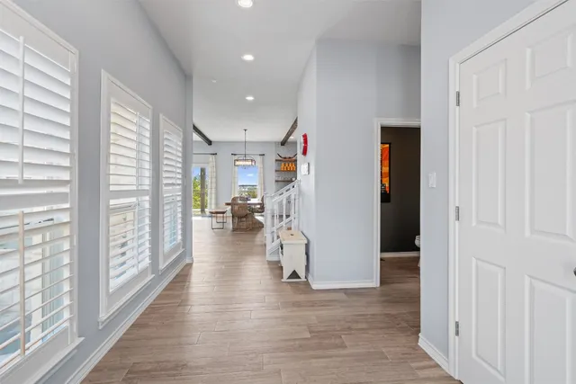 a view of a living room and hardwood floor