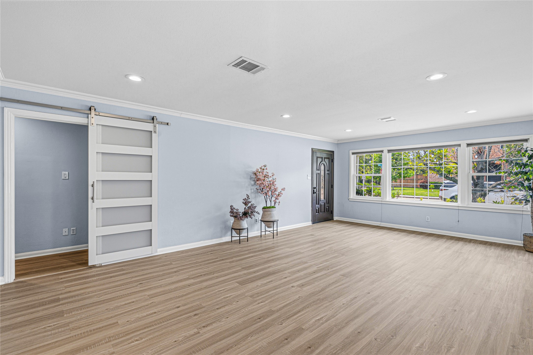 4002 Merrick Street Houston, TX 77025 - Photo 5 of 22 a view of a livingroom with a hardwood floor