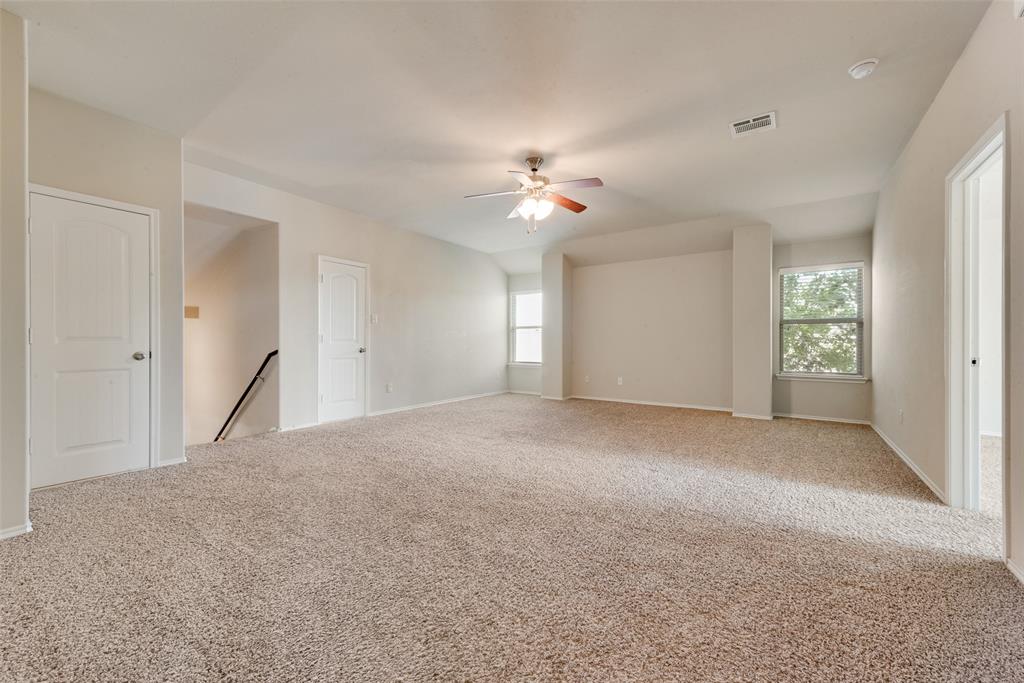 2004 Karsen Lane Heartland, TX 75126 - Photo 11 of 18 a view of empty room with a ceiling fan
