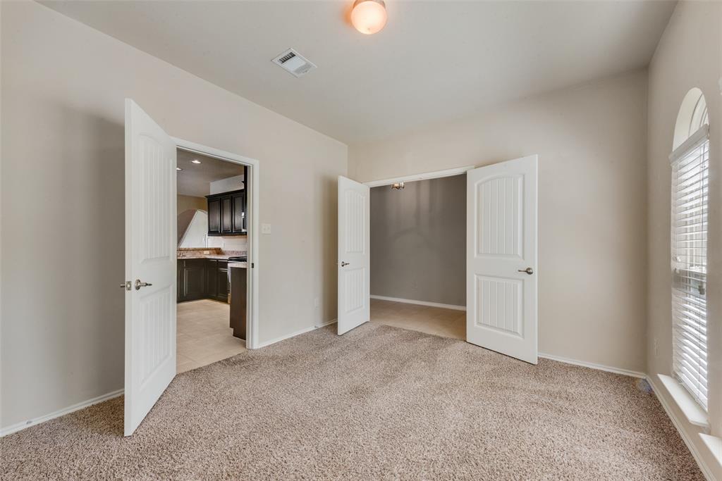 2004 Karsen Lane Heartland, TX 75126 - Photo 7 of 18 a view of a kitchen with a sink and a window