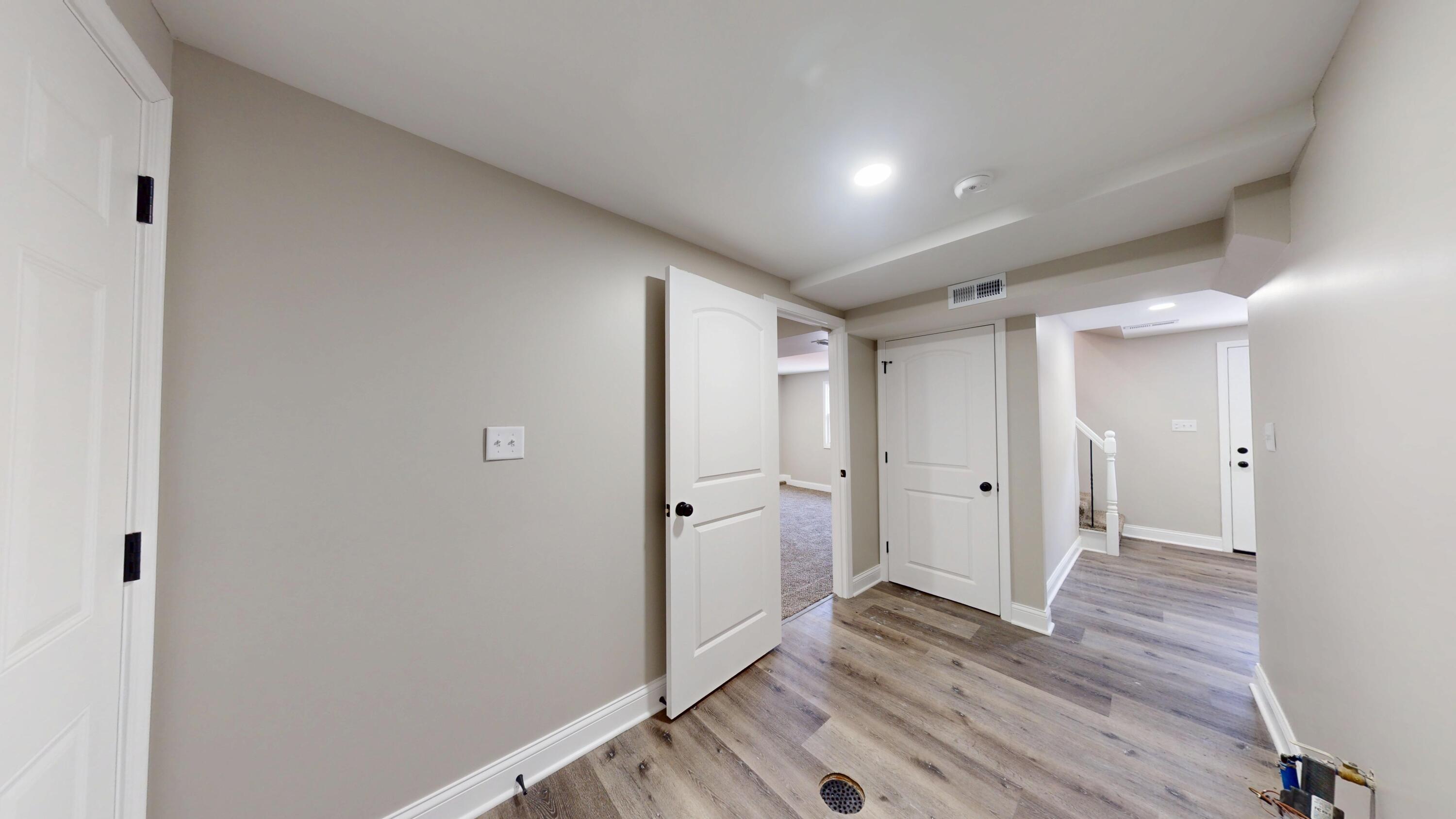 1528 Hanley Street Gary, IN 46406 - Photo 13 of 44 a bathroom with a sink and a mirror