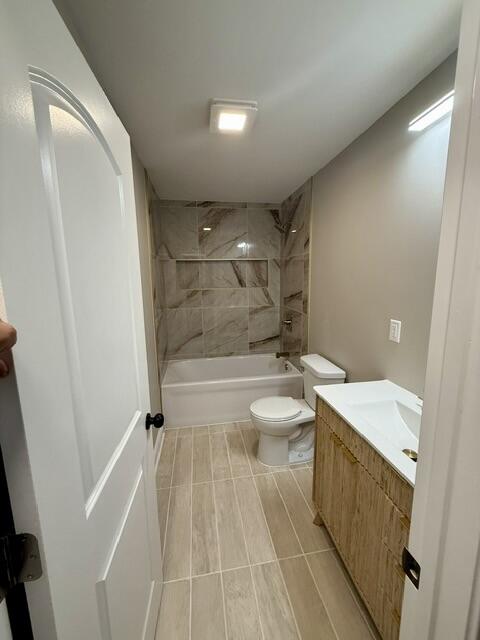 1528 Hanley Street Gary, IN 46406 - Photo 15 of 27 a bathroom with a sink a toilet and shower