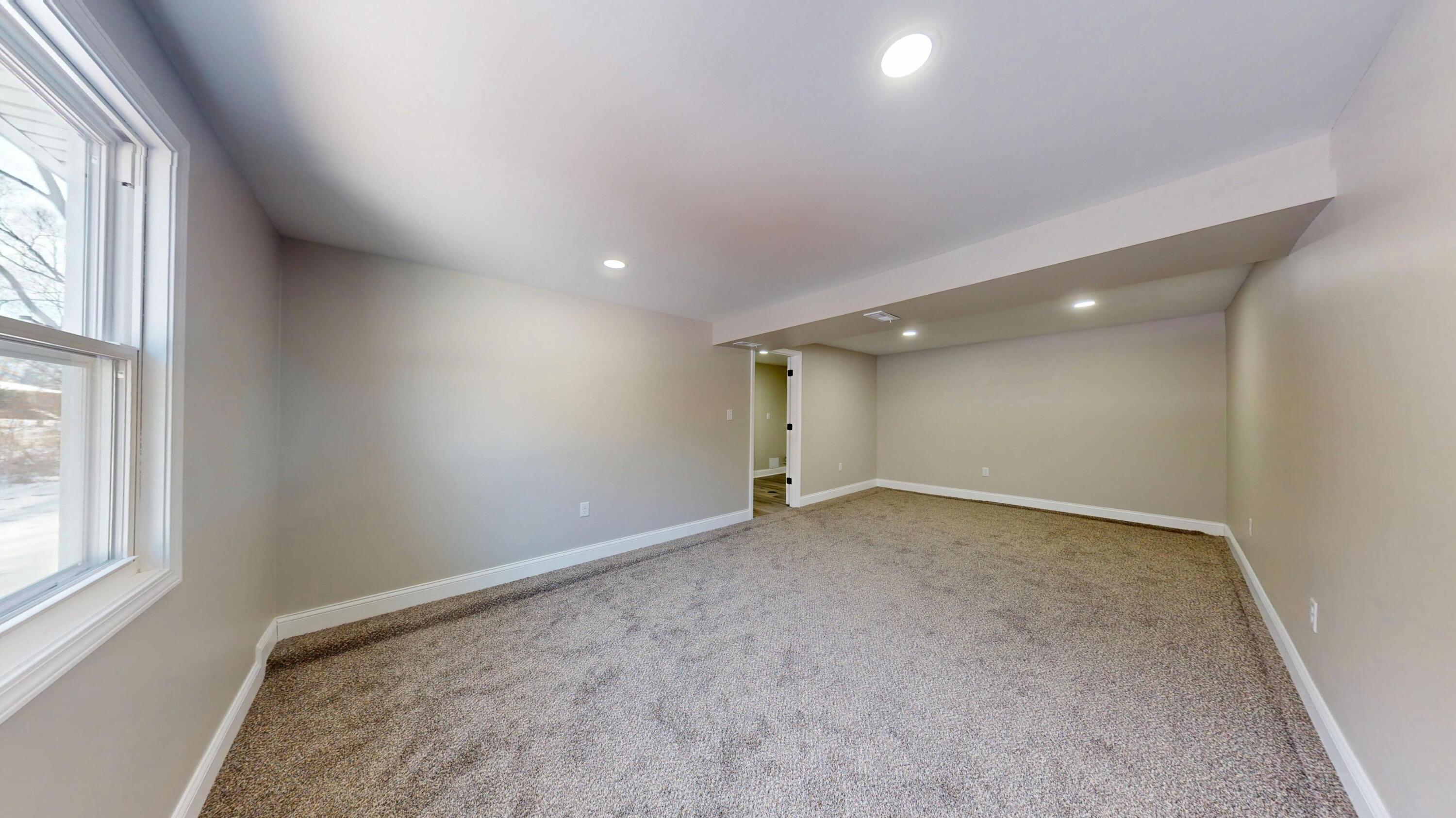 1528 Hanley Street Gary, IN 46406 - Photo 17 of 44 an empty room with windows and closet