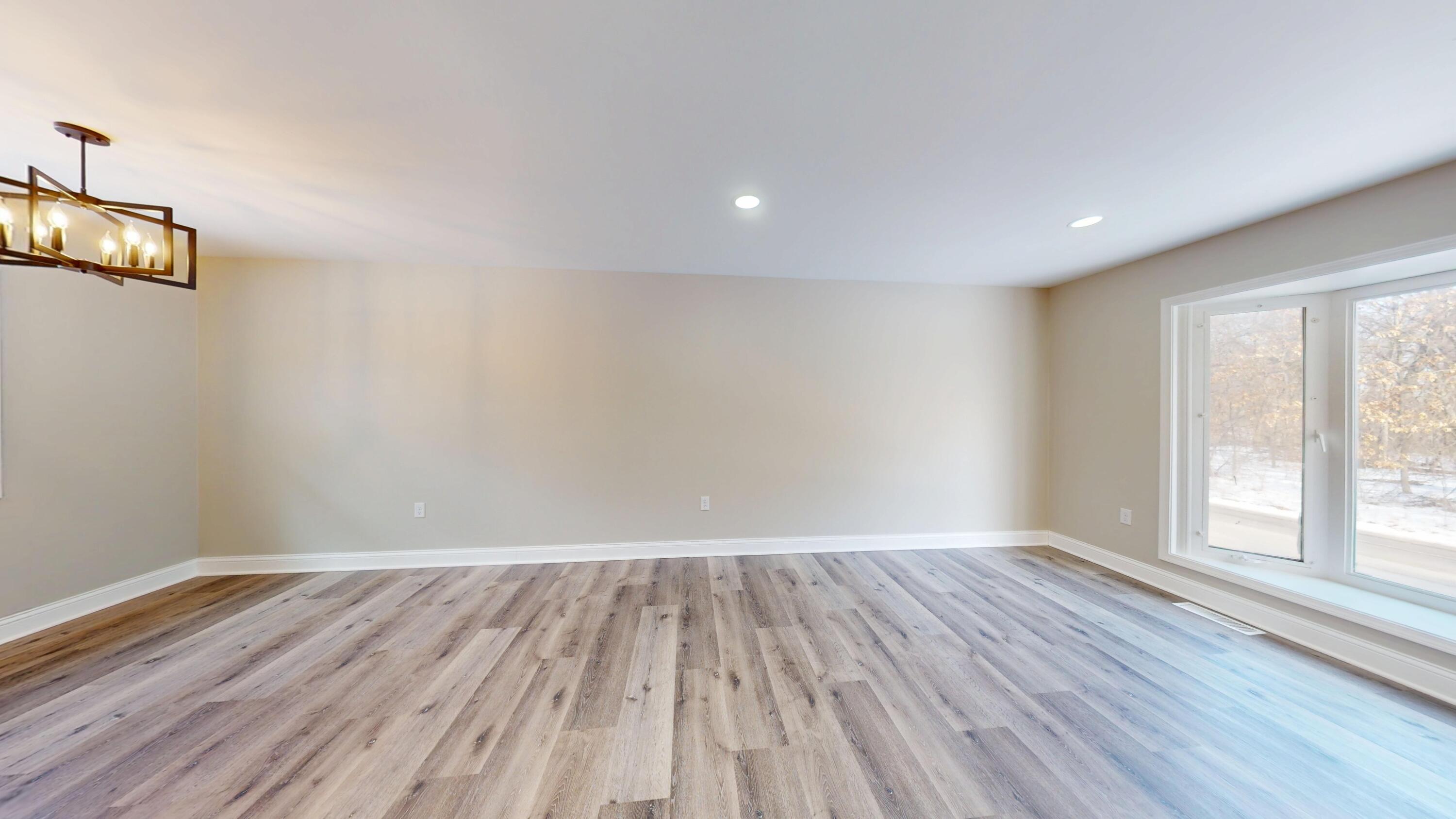 1528 Hanley Street Gary, IN 46406 - Photo 19 of 44 a view of room with window and wooden floor