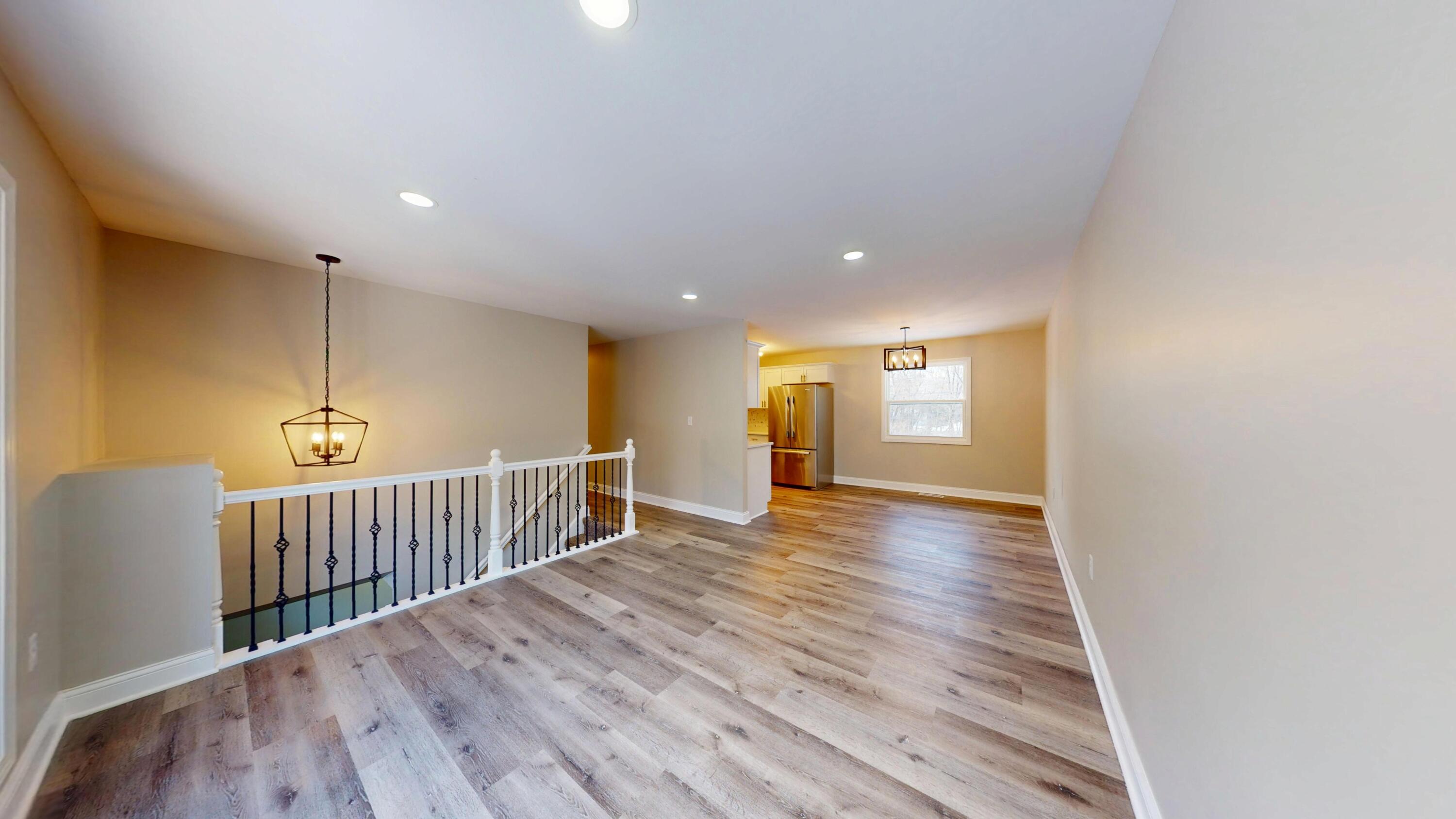 1528 Hanley Street Gary, IN 46406 - Photo 21 of 44 a view of a hallway with wooden floor