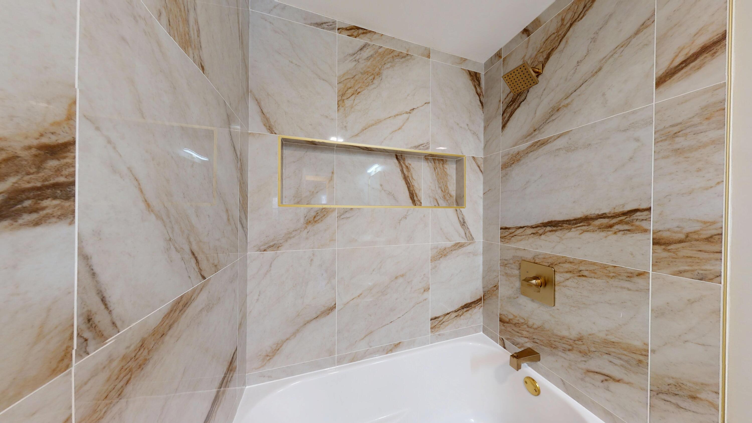 1528 Hanley Street Gary, IN 46406 - Photo 30 of 44 a bathroom with a glass shower door