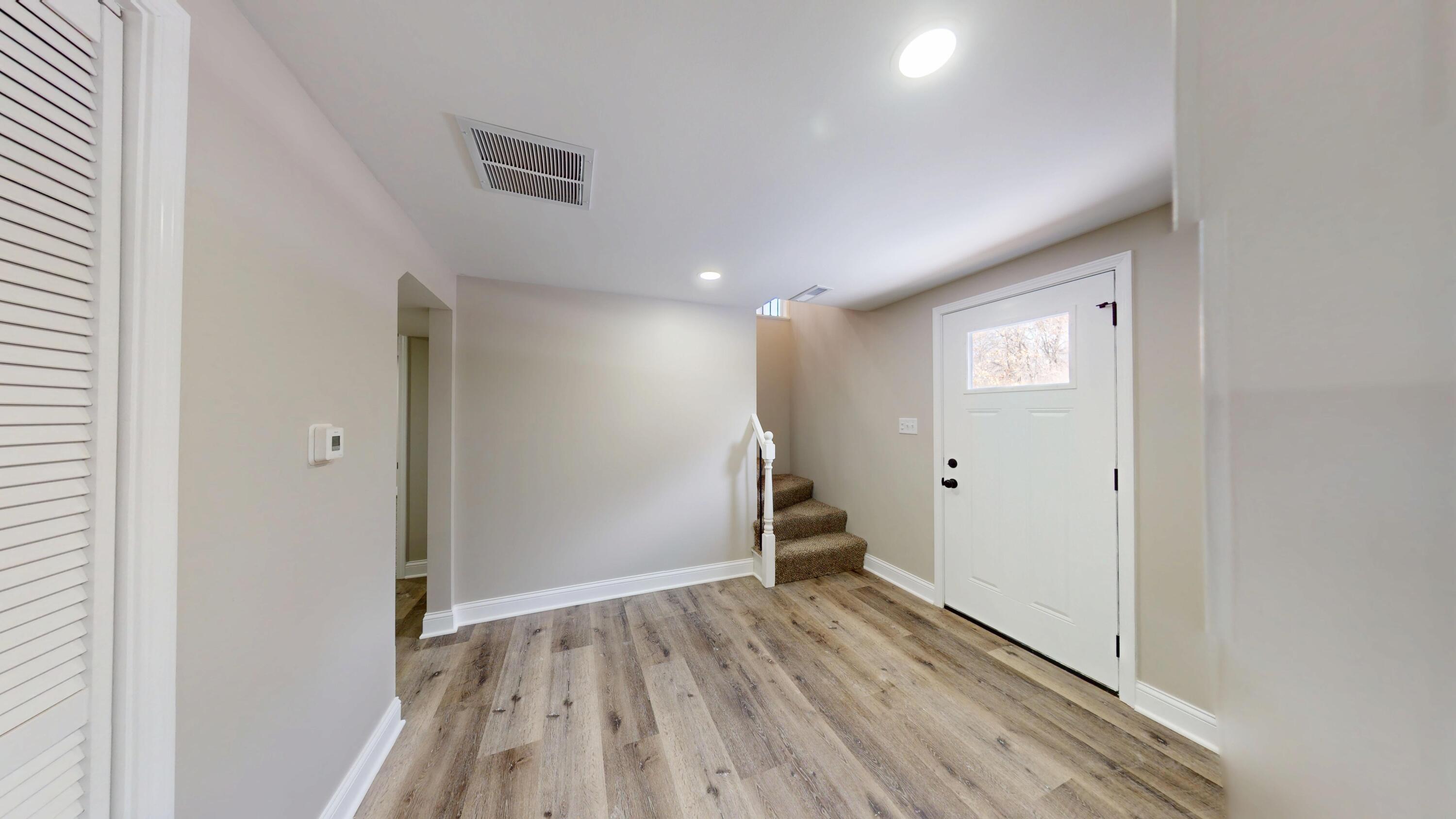 1528 Hanley Street Gary, IN 46406 - Photo 5 of 44 a view of empty room with wooden floor